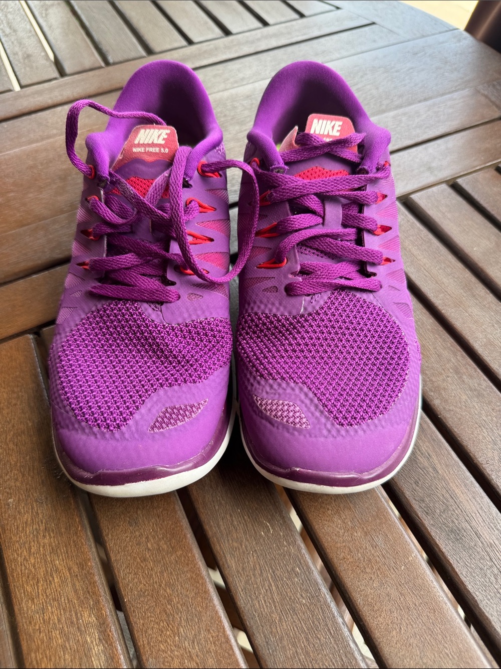 Nike Women's Purple Athletic Running Sneakers with Red Accents